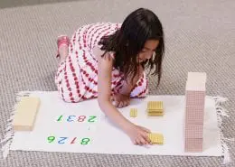 3K4A4254 a child working with Montessori metal insets, preparing for writing skills