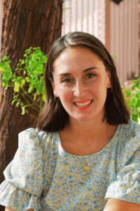 Heatheranne a child sorting objects by size, enhancing cognitive and motor development
